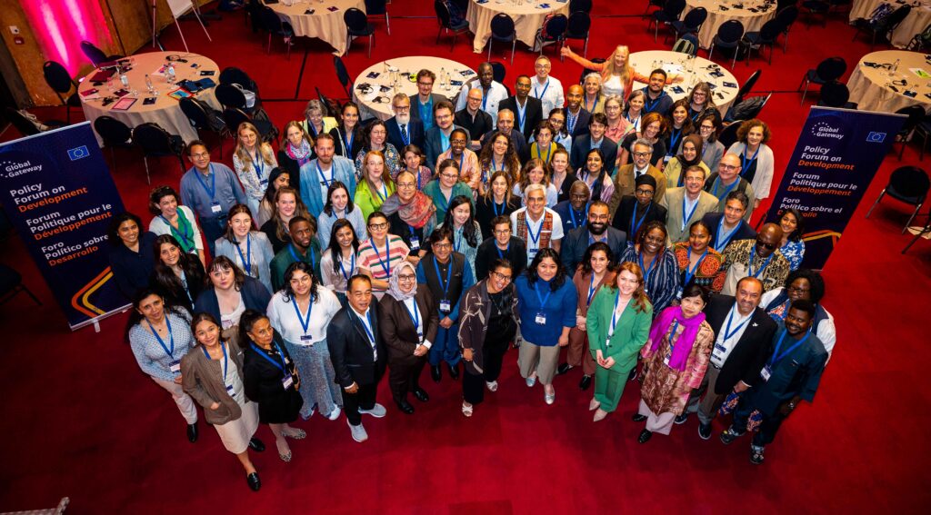 A group photo of participants of the Policy Forum on Development